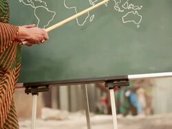 Senior Volunteer Indian woman teaching Rural Children Stock Footage