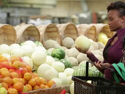 Woman shops for groceries Stock Footage
