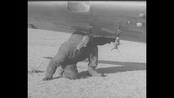 US military personnel with plane on airfield News Clip