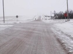 Blowing Snow Over Country Intersection Stock Footage