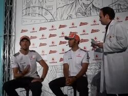 Button and Hamilton take racetrack rivalry to new Stock Footage