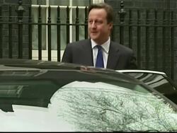 Cameron departs Downing Street on Budget day News Clip