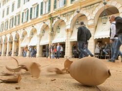 MS Impact of clay jugs at town square Esplanade on easter celebration / Kerkyra, Corfu, Greece Stock Footage