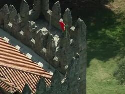 AERIAL MS Tourists in Guimaraes Castle / Guimares, Braga, Portugal Stock Footage
