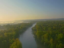AERIAL shot of a river at dawn Stock Footage