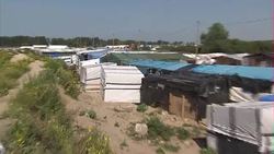 Rooftops of the Calais Jungle migrant camp News Clip