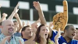 Stadium crowd cheers at football game, various high-fives Stock Footage