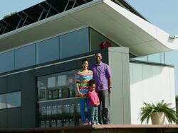 WS Family Portrait in Front of Solar Powered House / Richmond, Virginia, USA Stock Footage