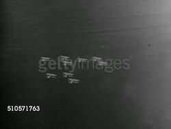 1930: US NAVY AIRCRAFT: TU WS Naval biplanes in flight. AERIAL TD XWS Naval biplanes in flight over water, over land, TU Grumman fighters flying, WS Fighter flying toward location, TU Biplane peeling back & moving down. (Believed to be Grumman F3F) Instructional Video