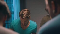 Guys playing tabletop soccer in apartment Stock Footage
