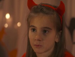 HD DOLLY: Little Girl Listening Halloween Spooky Stories Stock Footage