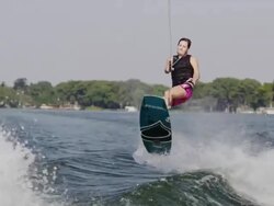 USA, Florida, Orlando, Maitland Lake, Woman on wakeboard Stock Footage