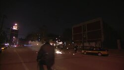 Fireworks shoot sparks on a street in Beijing. Stock Footage