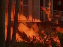 WS ZI ZO View of blazing fire at house / Unspecified Stock Footage