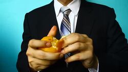 businessman hand hold orange Stock Footage