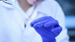 Scientist working in a Laboratory Pipettes and Tubes , Slow motion Stock Footage