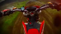 Enduro motorbike riding point of view Stock Footage