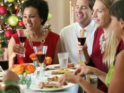 MS DS Group of Adult Couples Eating Dinner at Christmas Party / Richmond, Virginia, USA Stock Footage