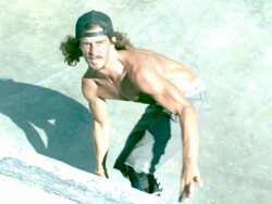 MS SLO MO Shot of skateboarder riding up out of bowl and riding back down / Venice, California, United States Stock Footage