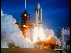 1970s wide shot space shuttle blasting off from launch pad / educational Stock Footage