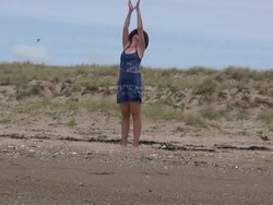 (HD1080i) Beach Yoga: Stretches Up and Namaste Stock Footage