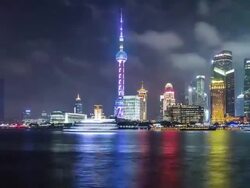 T/L WS PAN Sightseeing Boats Parade / Shanghai, China Stock Footage