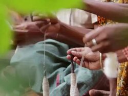 MS Shot of Many hands spinning yarn / Soe, Mt. Mutis, West Timor Indonesia Stock Footage