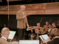 1956 Wide shot Charles Munch conducting the Boston Symphony Orchestra/ AUDIO Stock Footage