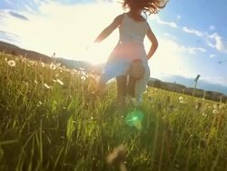 SUPER SLO-MO Girl Running In The Meadow At Sunset Stock Footage