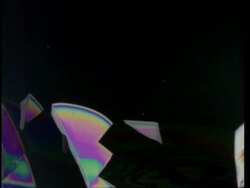 T/L CU colourful crystals grow across frame Stock Footage