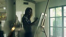 Young female painter at the artist's studio Stock Footage