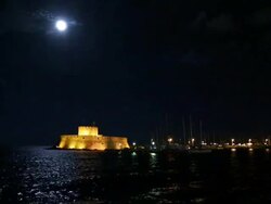 The fortress of Agios Nikolaos in Rhodes at night Stock Footage