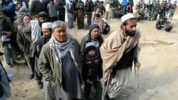 CLEAN: Afghan refugees line up for winter supplies News Clip