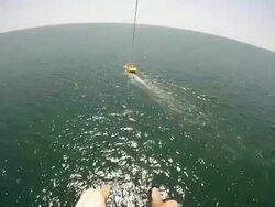 Parachuting over sea Stock Footage