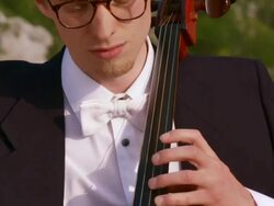CRANE: Young Man Playing Cello Stock Footage