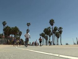 People cycing and jogging in Santa Monica News Clip