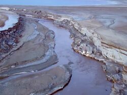 AERIAL WS TS View of muddy surface of dead sea in desert / Sourn Judea Desert, Israel  Stock Footage
