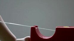 A child using a adhesive tape Stock Footage