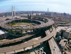 Time lapse high angle wide shot traffic on Nanpu Bridge spiral / Shanghai Stock Footage