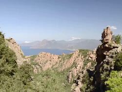 WS PAN View over fantastic rock landscape of Calanche of Piana to sea, UNESCO World Heritage Site / Porto, Corsica, France Stock Footage