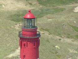 WS AERIAL View of lighthouse  / FoehrAmrum, Schleswig-Holstein, Germany Stock Footage