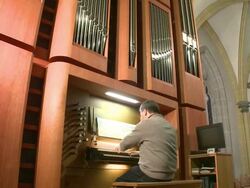 MS TU Organist at church organ playing / Saarburg, Rhineland-Palatinate, Germany Stock Footage