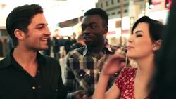 Young friends talk and laugh outside casino in downtown Las Vegas Stock Footage
