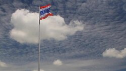 Thailand flag against a blue sky. Part 3 Stock Footage