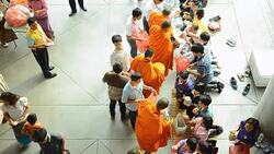 top view: group of Buddhist monks collecting alms and offerings Stock Footage