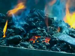 Burning Coal in Blacksmith Shop Stock Footage