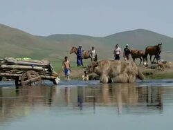 WS ZI Nomads moving camp at river / Central-south Mongolia, Mongolia Stock Footage