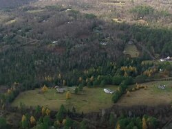 MS AERIAL ZI ZO PAN View of Frost Place - homestead of Robert Frost / New Hampshire, United States Stock Footage