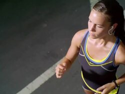 MS POV Girl jogging with ipod and earphone on street /New York, New York, United States Stock Footage