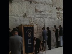 SYND 18-2-69 LEADERS OF JUDAISM FROM THE USA READ PSLAMS AT WAILING WALL News Clip